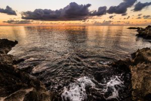 View to big volcanic rocks in sunset lights in San-Andres island, Caribbean.