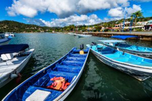 Beautiful view of several fishing boats on water in Samana, Dominican Republic