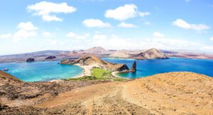 Panoramic view of " Isla Bartolome " at Galapagos Islands archipelago - Travel and wanderlust concept exploring world nature wonders around Ecuador - Vivid filter with warm bright color tones